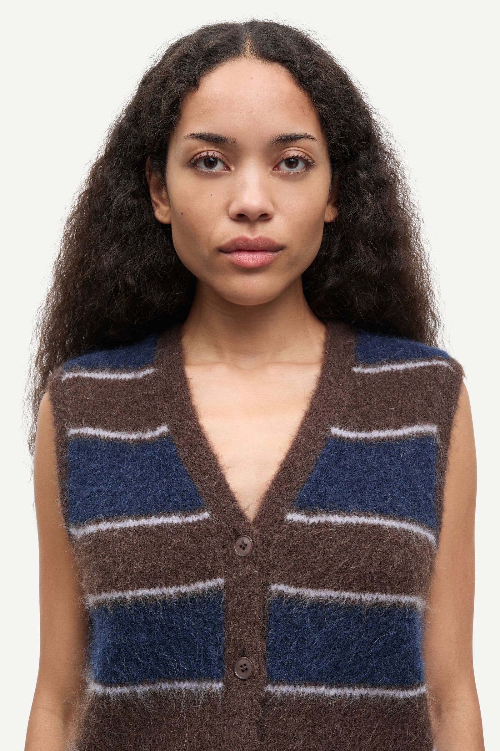 Sajeanne vest 15425 Black Coffee St.